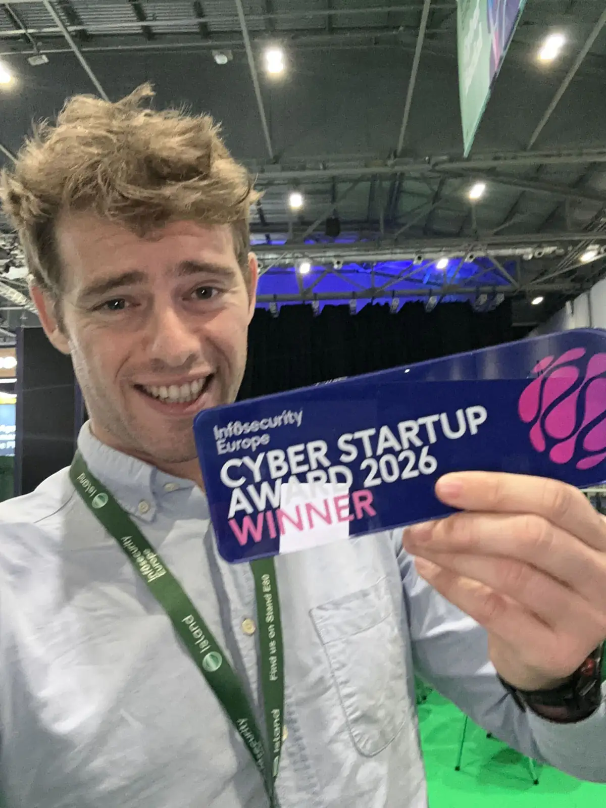 Lucas Masson holding the Infosecurity Europe Cyber Startup Award 2026 winner trophy